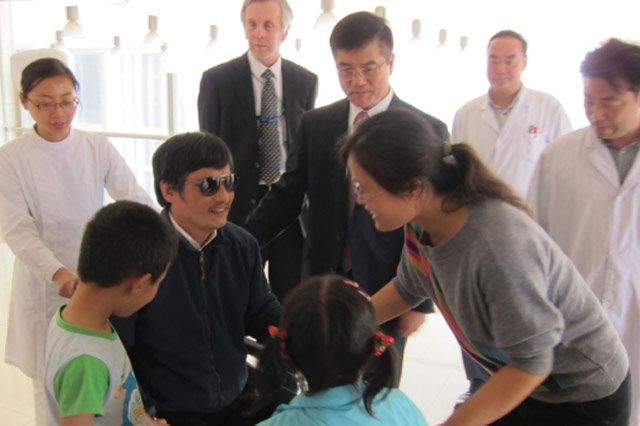Chen Guangcheng with his family yesterday at a hospital